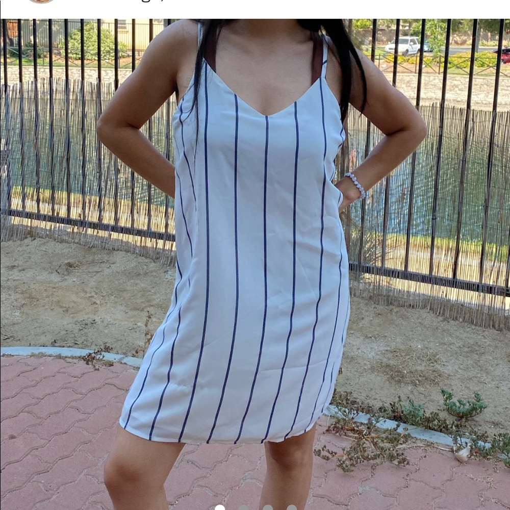 White and blue striped dress